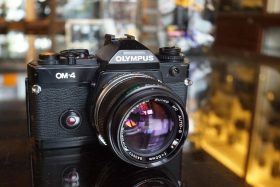 Olympus OM-4 black + OM 50mm F/1.4 MC lens