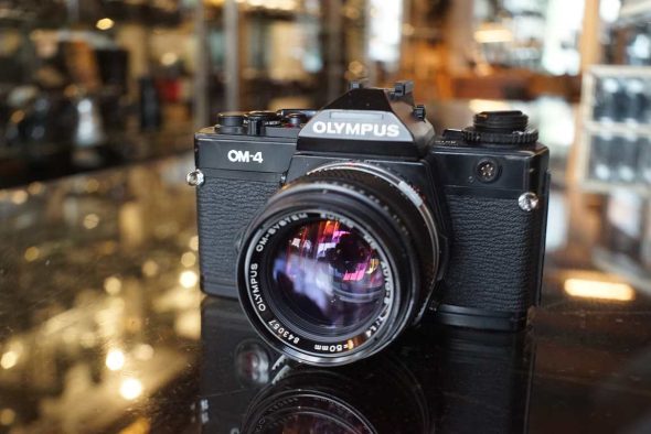 Olympus OM-4 black + OM 50mm F/1.4 MC lens