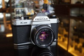 Pentax K1000 SLR + SMC 50mm F/2 lens, serviced