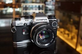 Olympus OM-10 with manual adapter + Zuiko 50mm f/1.8 lens