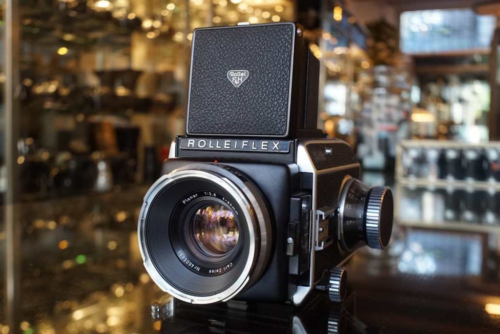 This Rolleiflex SL66 kit with Planar 80mm f/2.8 lens has just been serviced by Hans Klinkhamer, being completely checked over and serviced. The kit is still in very good cosmetical shape with regular wear on the outside of the camera. The shutterspeeds are all accurate again. Focusing screen has grid and center spot with some light cleaning marks. Transport turns smoothly and focus turns smooth with good dampening. Film back has good spacing and the counter works properly. The Planar 80mm f/2.8 lens has good working aperture. Some slight remaining edge haze but other than that in very good shape. A lovely kit ready to be used again.this item comes with a 3 month limited warranty