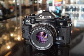 Canon A-1 + FD 50mm f/1.8 SC kit, worn but serviced