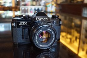 Canon AE-1 black + nFD 50mm f/1.8 lens kit