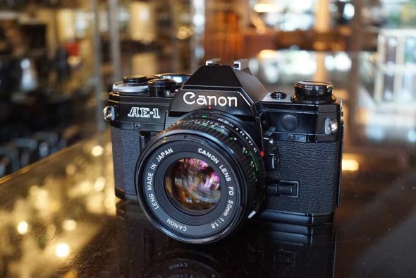 Canon AE-1 black + nFD 50mm f/1.8 lens kit