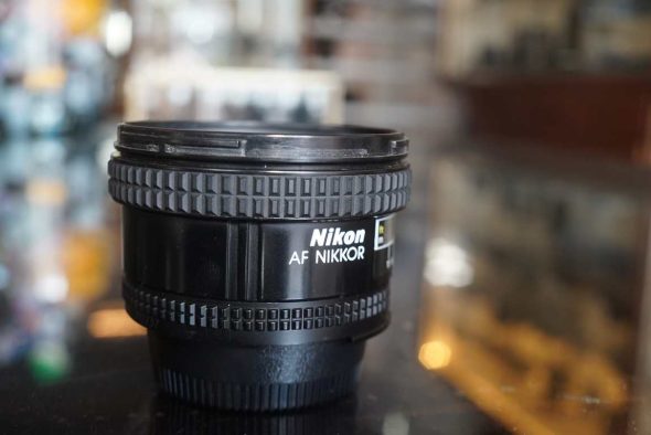 Nikon AF Nikkor 20mm F/2.8 lens with HB-4 lenshood, boxed