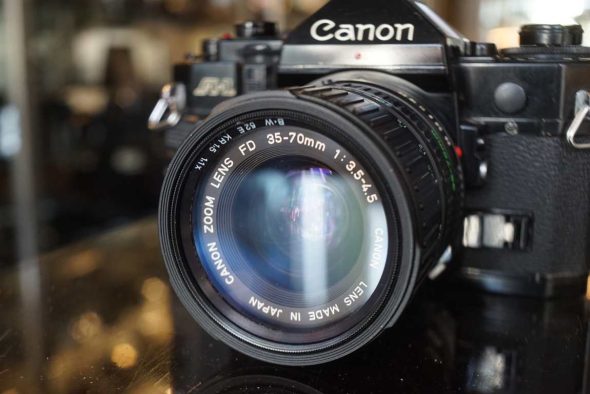 Canon A-1 + nFD 35-70mm f/3.5-4.5 lens kit