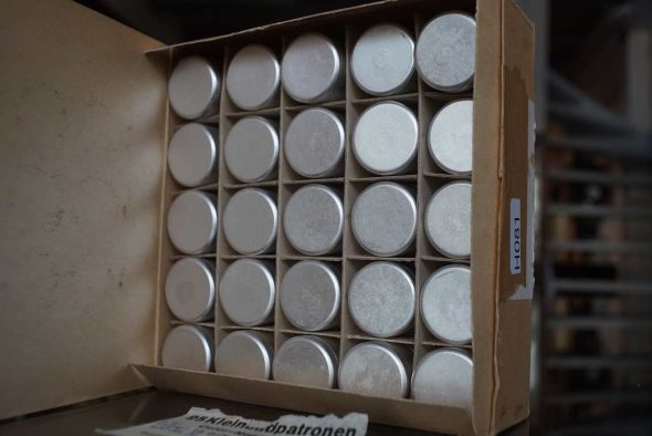 25x unknown color film in metal canisters, long expired (1970)