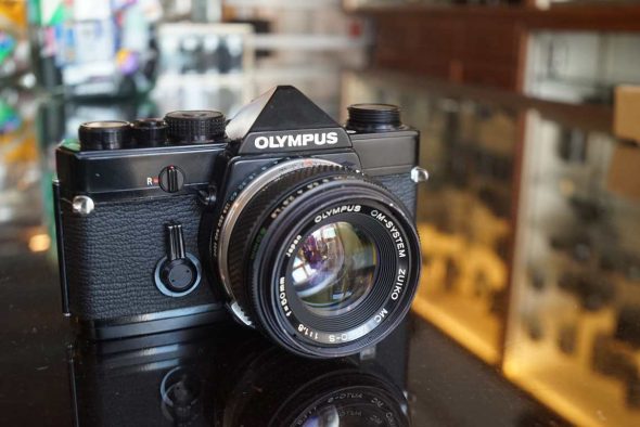 Olympus OM-1 black + Zuiko 50mm f/1.8 MC