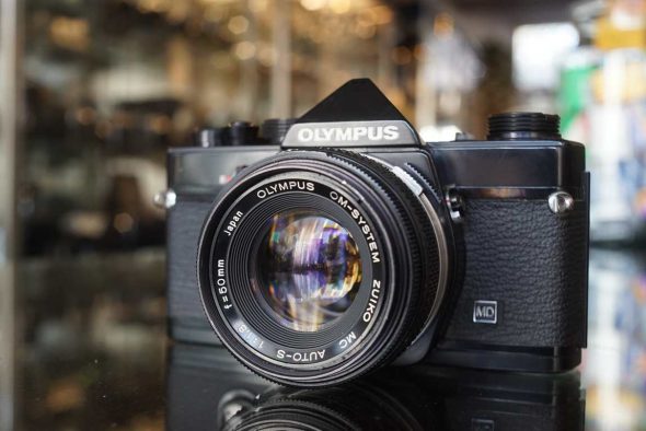Olympus OM-1 black + Zuiko 50mm f/1.8 MC