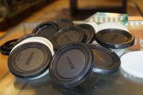 Lot of 22 Nikon F mount body caps, various kinds