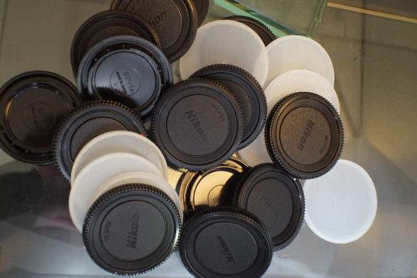 Lot of 22 Nikon F mount body caps, various kinds