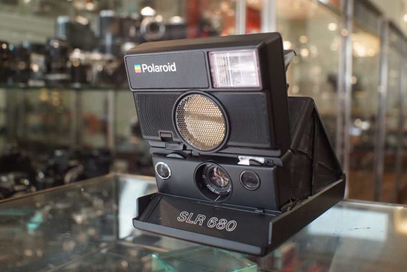 Polaroid SLR 680 instant camera black in black leather case