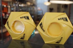 Nikon Yellow Hexagonal lens display stands, 2 pieces, boxed