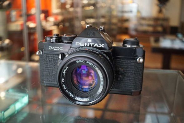 Pentax MX black with SMC-M 50mm f/2 lens, bump