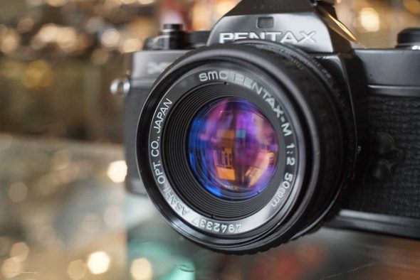 Pentax MX black with SMC-M 50mm f/2 lens, bump
