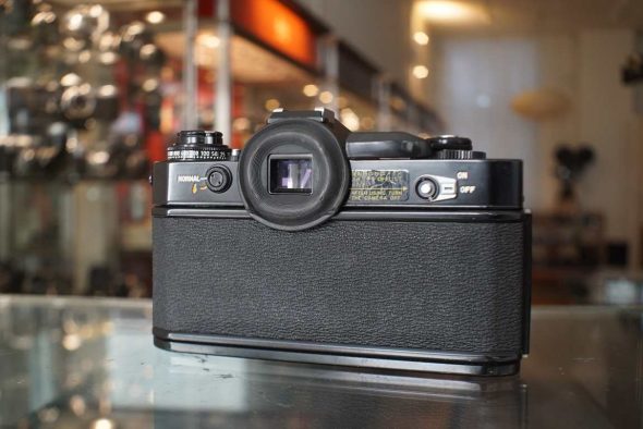 Canon EF + Canon FD 50mm f/1.4 Chrome nose, with remarks