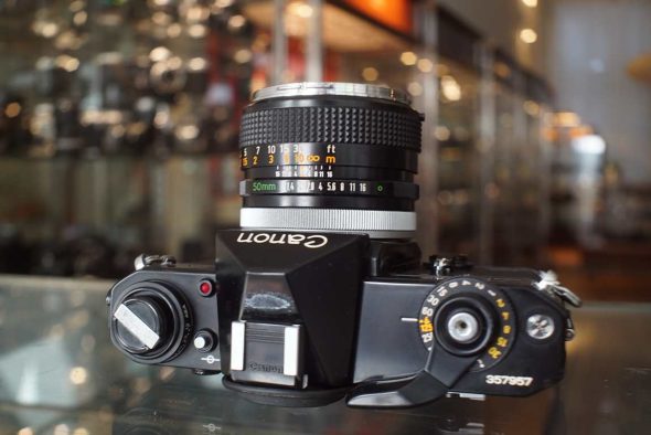 Canon EF + Canon FD 50mm f/1.4 Chrome nose, with remarks