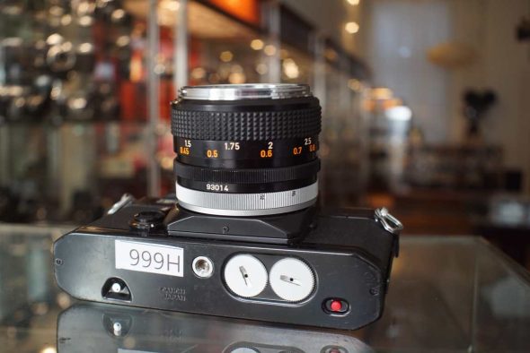Canon EF + Canon FD 50mm f/1.4 Chrome nose, with remarks