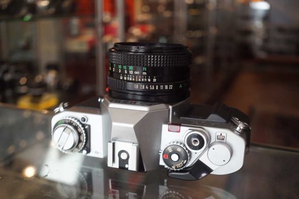 Canon AV-1 + newFD 50mm f/1.8 w/ hood