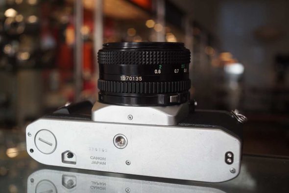 Canon AV-1 + newFD 50mm f/1.8 w/ hood